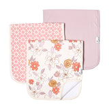 Three burp cloths with floral patterns on a white background