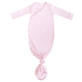 Pink baby knotted gown on a white background