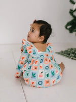 Leah Romper in Holiday Stamps