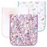 Three burp cloths with floral and butterfly patterns on a white background