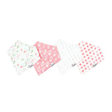 Set of four baby bibs with floral, polka dot, and other patterns on a white background