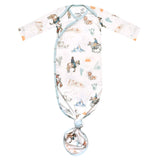 Baby knotted gown with cowboy pattern on a white background
