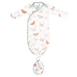 Baby knotted gown with butterfly pattern on a white background