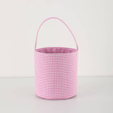 Pink and white gingham bucket bag on a light gray background