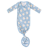 Baby knotted gown with floral pattern on a light blue background